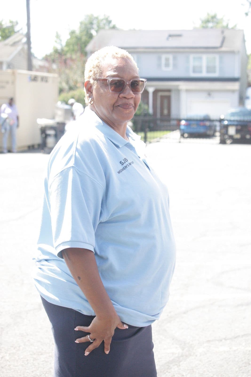 A member of the Women’s Ministry in her ministry shirt at a church gathering