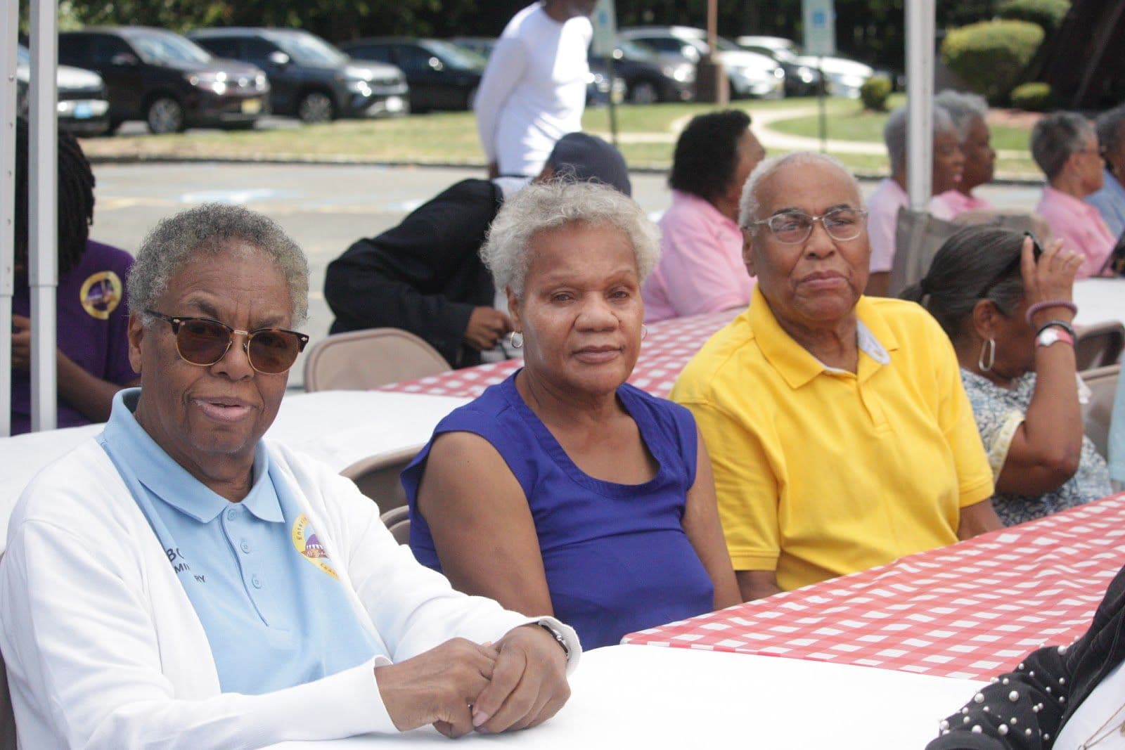 Members sharing a table at a church gathering